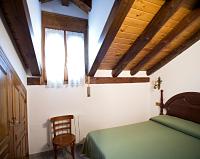 Postel nebo postele na pokoji v ubytování Apartamentos Casa Buisan