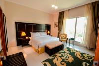 Postel nebo postele na pokoji v ubytování Coral Boutique Villas