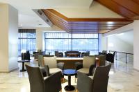 A seating area at Exe Isla Cartuja