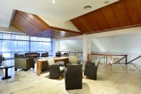 A seating area at Exe Isla Cartuja