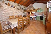 Kuchyň nebo kuchyňský kout v ubytování Apartmani Marta