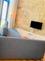 TV a/nebo společenská místnost v ubytování Oporto Chic&Cozy - Santo Ildefonso