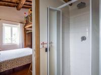 Łóżko lub łóżka w pokoju w obiekcie Villa Vista da Rocca di Papa-2 by Interhome