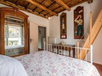 Łóżko lub łóżka w pokoju w obiekcie Villa Vista da Rocca di Papa-2 by Interhome