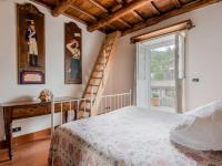Łóżko lub łóżka w pokoju w obiekcie Villa Vista da Rocca di Papa-2 by Interhome