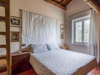 Łóżko lub łóżka w pokoju w obiekcie Villa Vista da Rocca di Papa-2 by Interhome