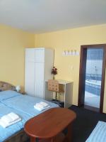 Postel nebo postele na pokoji v ubytování Vila Terezie