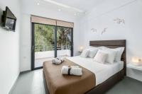 A bed or beds in a room at Villa Summer Light