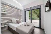 A bed or beds in a room at Villa Summer Light