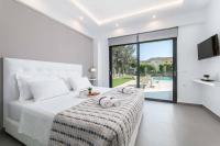 A bed or beds in a room at Villa Summer Light
