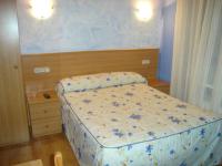 Postel nebo postele na pokoji v ubytování Hotel Doña Maria