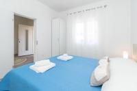 Posteľ alebo postele v izbe v ubytovaní Apartments Peca