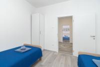 Posteľ alebo postele v izbe v ubytovaní Apartments Peca