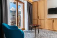 Televízia a/alebo spoločenská miestnosť v ubytovaní Hotel Lajadira & Spa