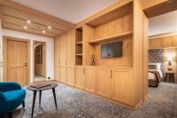Televízia a/alebo spoločenská miestnosť v ubytovaní Hotel Lajadira & Spa