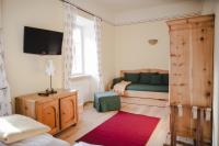 Łóżko lub łóżka w pokoju w obiekcie Hotel-Gasthof Weitgasser