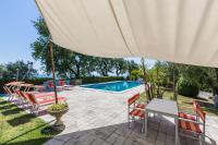 The swimming pool at or close to Villa Claudia