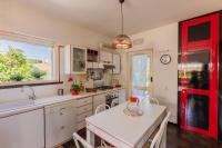 A kitchen or kitchenette at Villa Claudia