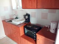 Kuchyň nebo kuchyňský kout v ubytování Tania village Zakros maisonette