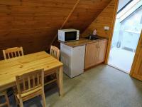 Kuchyň nebo kuchyňský kout v ubytování Apartmány U Vlka