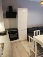 Kuchyňa alebo kuchynka v ubytovaní Apartament Centrum Więckowskiego
