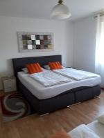 Ferienwohnung Grimmerにあるベッド