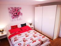 Postel nebo postele na pokoji v ubytování Apartman "Sabine red" with heated pool