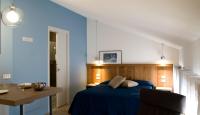 Posteľ alebo postele v izbe v ubytovaní Hotel Oliva