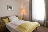Postel nebo postele na pokoji v ubytování Hotel Mingarden