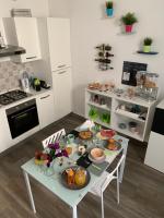 A kitchen or kitchenette at Perla Marina