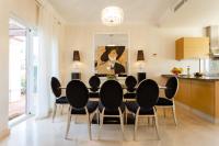 a dining room with a table and chairs at Arcos Gardens Sol Rent Golf in Arcos de la Frontera