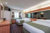 Ein Bett oder Betten in einem Zimmer der Unterkunft Microtel Inn &amp; Suites by Wyndham Uncasville Casino Area