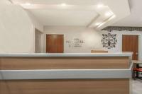 a waiting room at the mendez dental clinic at Microtel Inn & Suites by Wyndham Auburn in Auburn