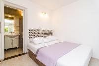 Posteľ alebo postele v izbe v ubytovaní Plavac Mali Suites