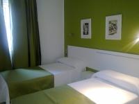 Postel nebo postele na pokoji v ubytování Hostal Victoria Mar
