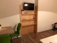 TV a/nebo společenská místnost v ubytování Rettensteinerhof Wirtshaus