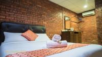 SANDY GARDEN RESORT LANGKAWIにあるベッド