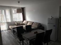 A seating area at ApartVel apartment 1