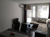 A seating area at ApartVel apartment 1