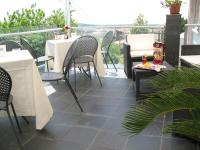 A restaurant or other place to eat at Hotel Vittoria