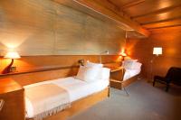 A bed or beds in a room at Villa Gaudi