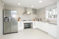 A kitchen or kitchenette at Villa Gaudi
