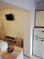 Kuchyňa alebo kuchynka v ubytovaní Apartmani Dina