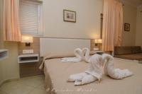 Posteľ alebo postele v izbe v ubytovaní Flisvos Rooms