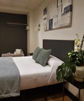 Posteľ alebo postele v izbe v ubytovaní Hotel Malecon