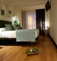 Posteľ alebo postele v izbe v ubytovaní Hotel Malecon