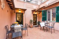 A seating area at Green Apartments Rome