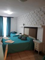 Posteľ alebo postele v izbe v ubytovaní Albergo Del Centro Storico