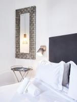 Posteľ alebo postele v izbe v ubytovaní Art Pantheon - Suites & Apartments