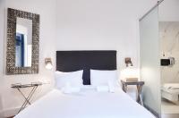 Posteľ alebo postele v izbe v ubytovaní Art Pantheon - Suites & Apartments